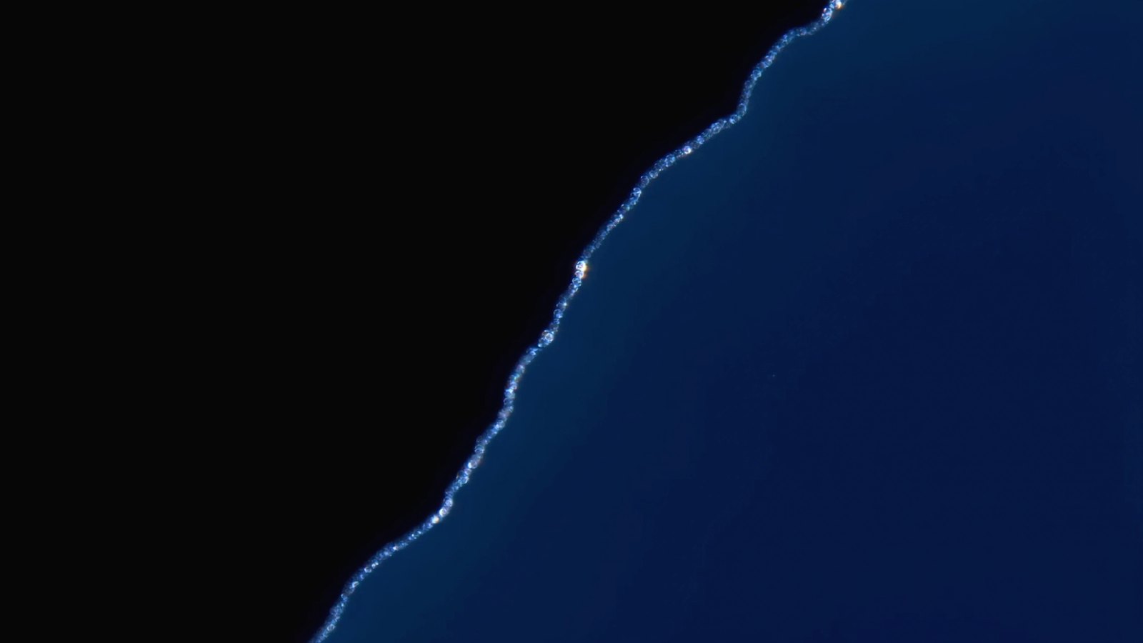a dark abstract 16:10 panel in the manner of the gold threads, a new one, calm on the left